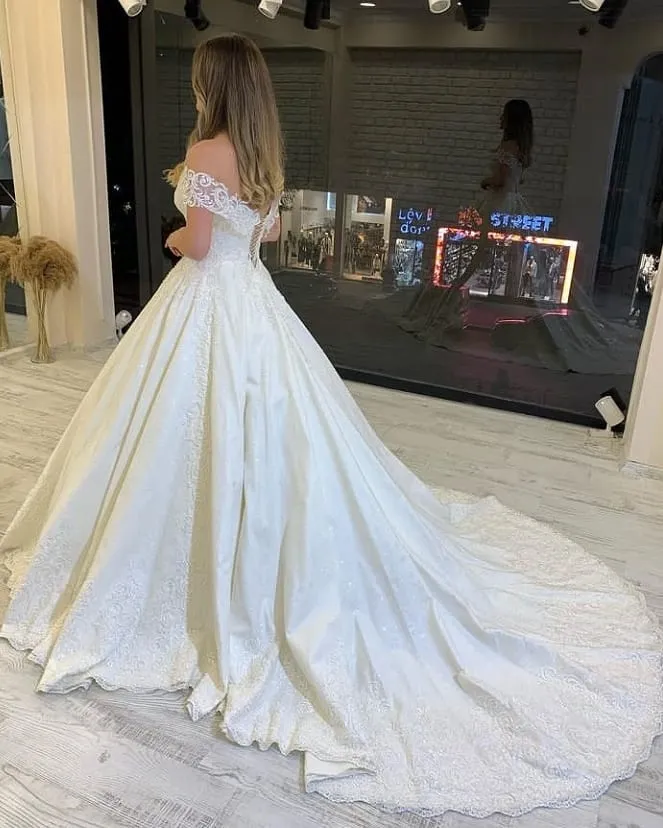 Classy A-Line Off-the-Shoulder Wedding Dress With Train Lace Appliques